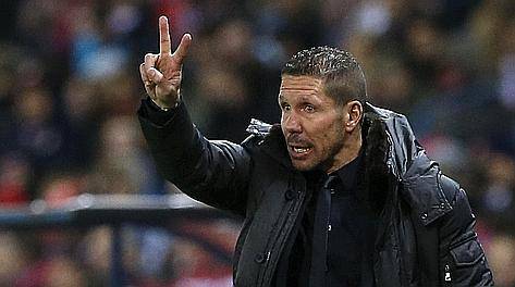 Atletico Madrid's coach Diego Simeone gestures during their Spanish first division soccer match against Getafe at the Vicente Calderon stadium in Madrid