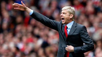Arsenal's manager Arsene Wenger reacts during the English Premier League football match against Manc