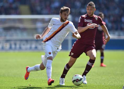TURIN, ITALY - APRIL 12:  Adem Ljajic (L) of AS Roma in action against Omar El Kaddouri of Torino FC during the Serie A match between Torino FC and AS Roma at Stadio Olimpico di Torino on April 12, 2015 in Turin, Italy.  (Photo by Valerio Pennicino/Getty Images)