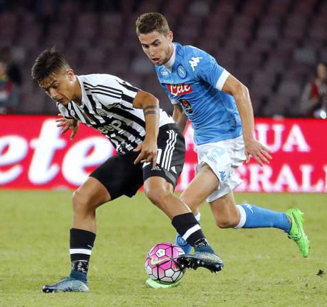 Juventus' Argentinian forward Paulo Dybala (L) vies with Napoli's Brazilian midfielder Jorginho during the Italian Serie A football match SSC Napoli vs FC Juventus on September 26, 2015 at the San Paolo stadium in Naples. AFP PHOTO / CARLO HERMANN (Photo credit should read CARLO HERMANN/AFP/Getty Images)