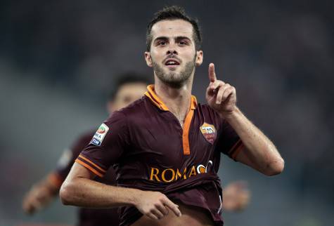 AS Roma's Miralem Pjanic celebrates after scoring against Napoli during their Serie A soccer match at Olympic stadium in Rome