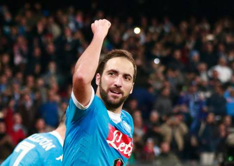 Napoli's Argentinian-French forward Gonzalo Higuain celebrates after scoring during the Italian Serie A football match SSC Napoli vs Inter Milan on November 30, 2015 at the San Paolo stadium in Naples. AFP PHOTO / CARLO HERMANN / AFP / CARLO HERMANN (Photo credit should read CARLO HERMANN/AFP/Getty Images)