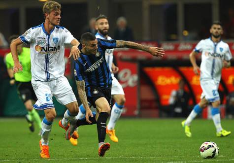 MILAN, ITALY - MAY 31: Mauro Emanuel Icardi (R) of FC Internazionale Milano competes for the ball with Daniele Rugani (R) of Empoli FC during the Serie A match between FC Internazionale Milano and Empoli FC at Stadio Giuseppe Meazza on May 31, 2015 in Milan, Italy. (Photo by Marco Luzzani/Getty Images)