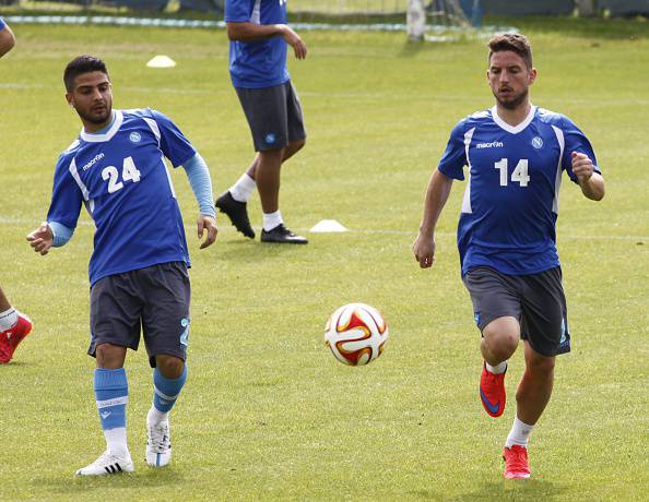 Napoli's forward from Belgium Dries Mertens (R) and forward from Italy Lorenzo Insigne take part in a training session on the eve of the UEFA Europa League semi final first leg football match SSC Napoli vs FK Dnipro on May 6, 2015 at the SSC Napoli headquarters in Castelvolturno. AFP PHOTO / CARLO HERMANN        (Photo credit should read CARLO HERMANN/AFP/Getty Images)