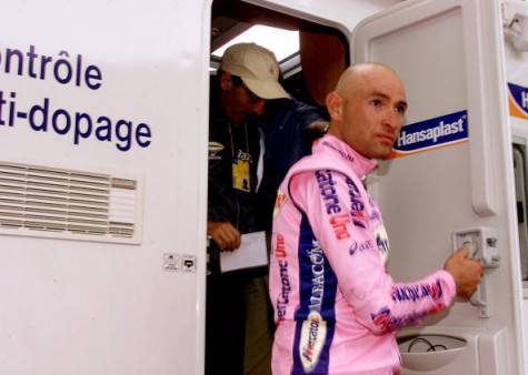 MONT VENTOUX, FRANCE:  Italian Marco Pantani gets out of the Tour de France medical vehicle after a doping control following his victory in the 12th stage of the 87th French cycling race in le Mont-Ventoux, southern France, 13 July 2000. (Photo credit should read JOEL SAGET/AFP/Getty Images)