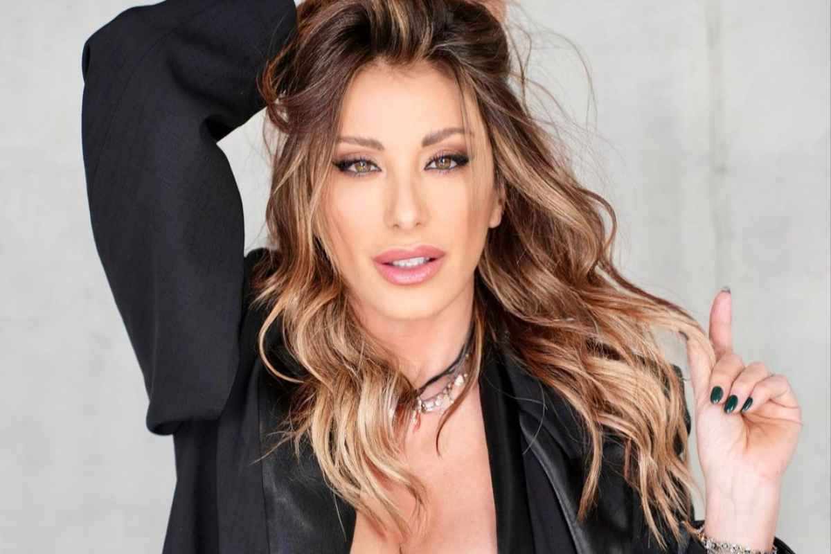 Sabrina Salerno costume jeans scollatura